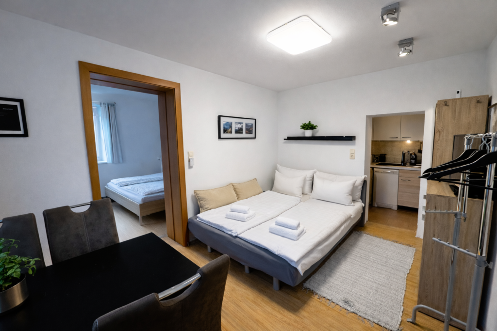 Wohnzimmer mit Schlafsofa